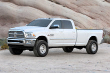 Load image into Gallery viewer, Fabtech 2.5 in. COIL SPCR KIT W/PERF SHKS 2013-18 RAM 3500 4WD W/FACTORY RADIUS ARMS